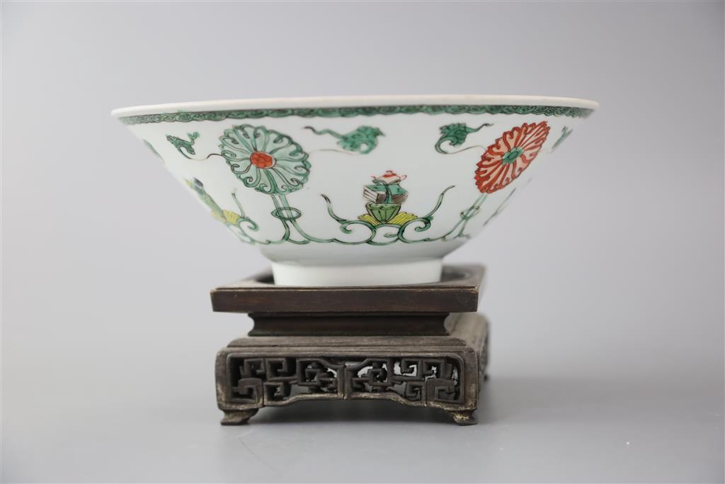 A Chinese famille verte conical shaped bowl, Kangxi period, 20.5cm diameter, ebonised wood stand